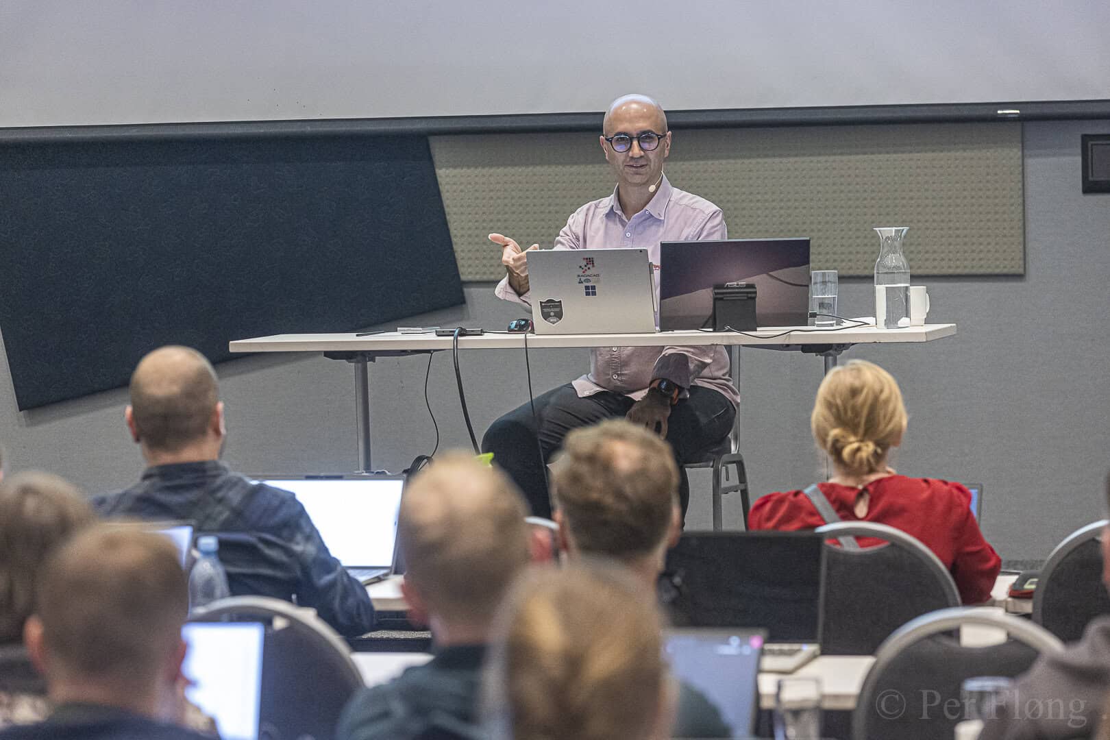 Reza Rad presenting at a Microsoft conference